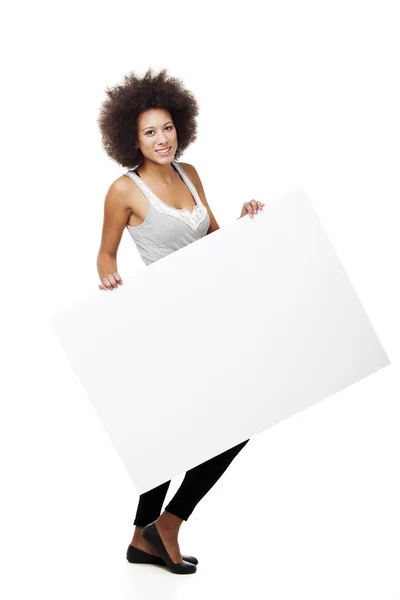 Γυναίκα που κρατά μια λευκή πινακίδα — Φωτογραφία Αρχείου