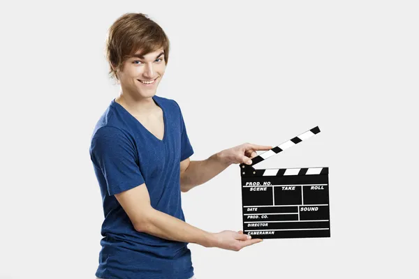 Holding a clapboard — Stock Photo, Image