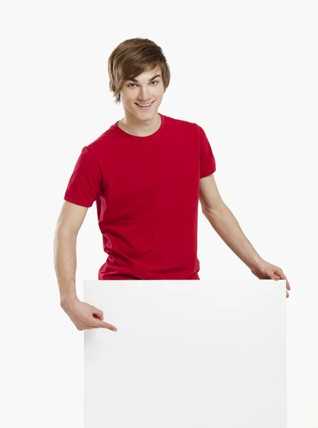 Man holding a cardboard — Stock Photo, Image
