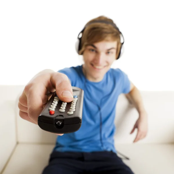 Man with a remote control — Stock Photo, Image