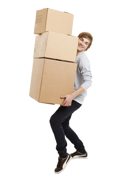 Человек держит карточные коробки — стоковое фото