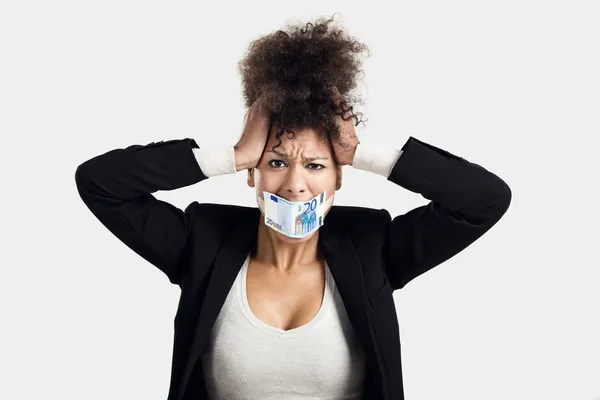 Covering mouth with a euro banknote — Stock Photo, Image