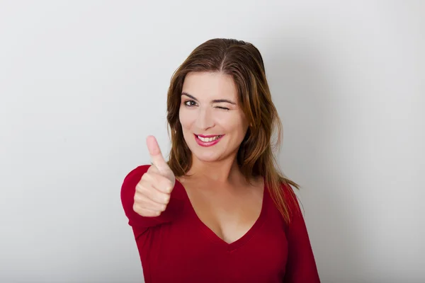 Happy woman with thumbs up — Stock Photo, Image