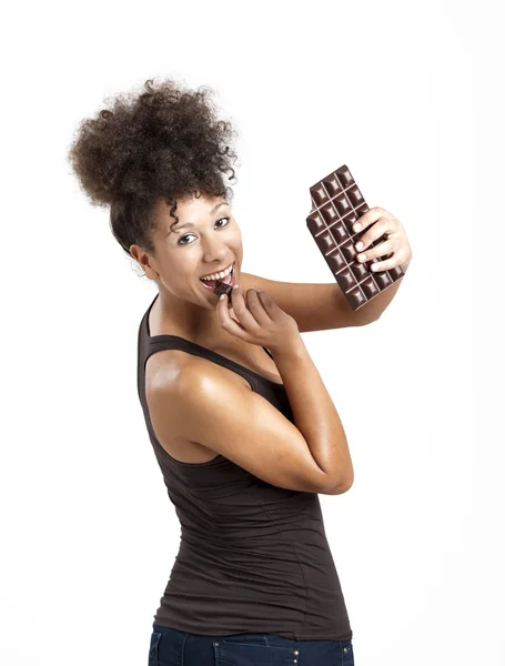 Kobieta jedzenie chcolate — Zdjęcie stockowe