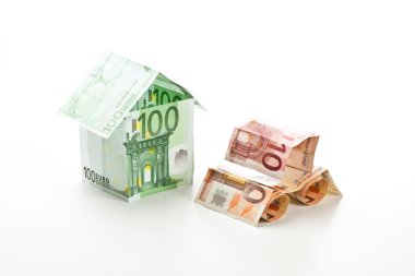 The car and the house made of euros clipart