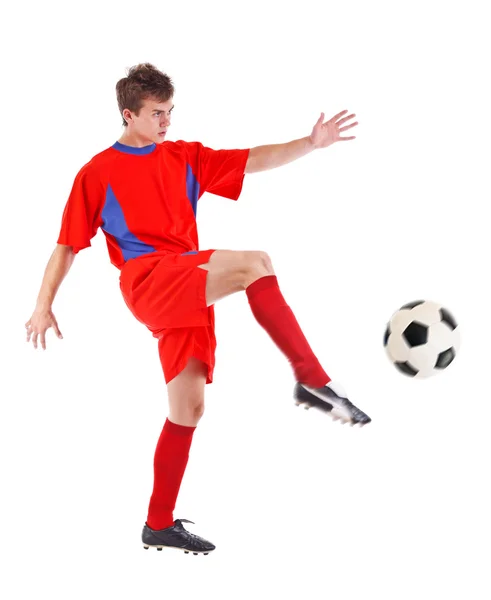 Voetbal speler schoppen de bal — Stockfoto