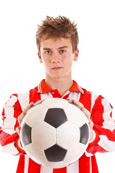 Jogador de futebol segurando uma bola — Fotografia de Stock