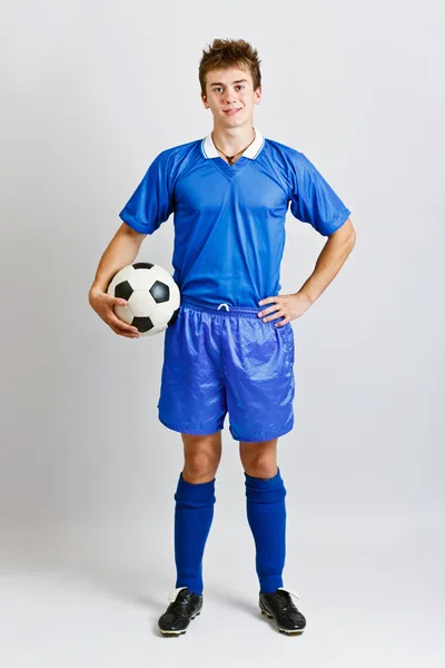 Fotbollspelare med boll — Stockfoto