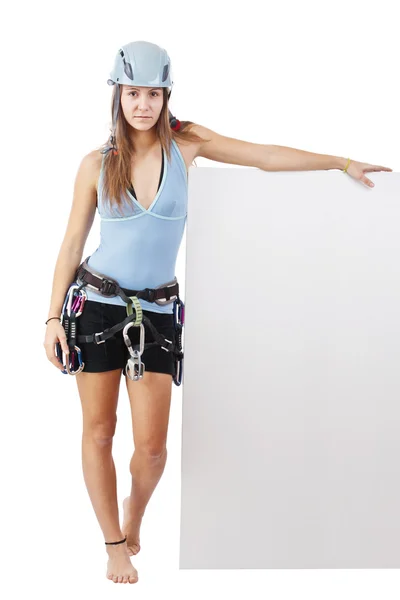 Młoda kobieta w sprzętu alpinistycznego — Zdjęcie stockowe