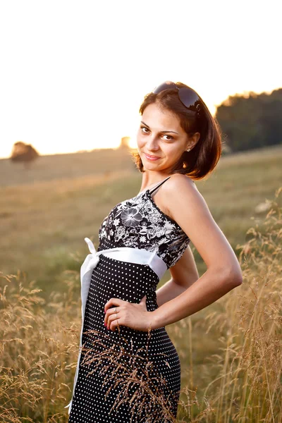 Adorable woman in field — Stock Photo, Image