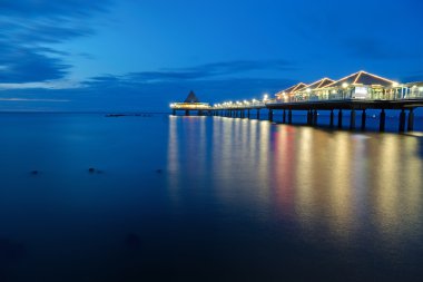 The pier of Heringsdorf at dawn clipart