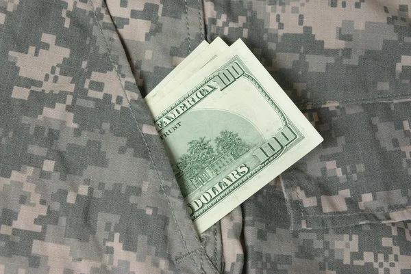 Uniform with a banknote — Stock Photo, Image