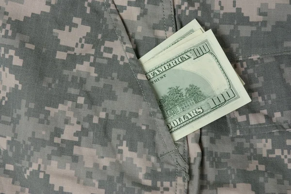 Dollars in us army uniform pocket — Stock Photo, Image