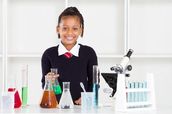 Elementary school pupil in science class — Stock Photo, Image