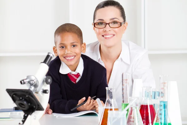 Elementary science teacher and student — Stock Photo, Image