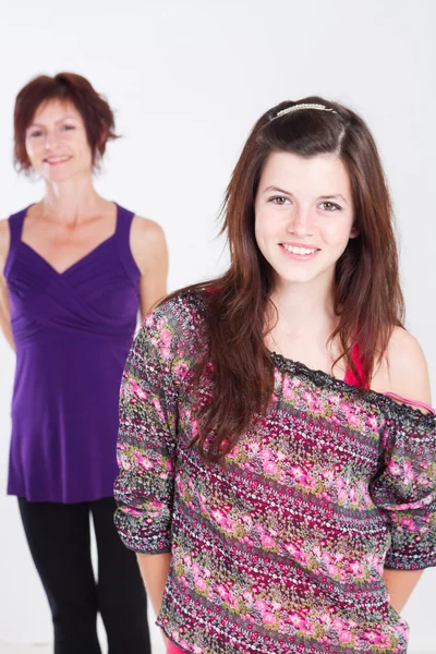 Happy teenager girl and middle aged mother — Stock Photo, Image