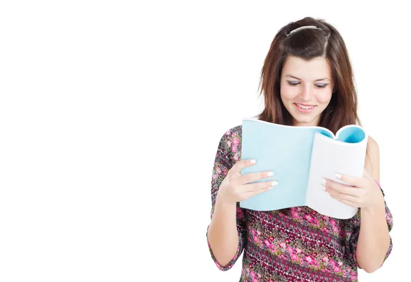 Pretty teen girl reading book — Stok fotoğraf