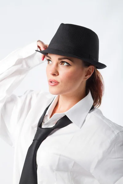 Young woman dressing in men's clothing Stock Picture