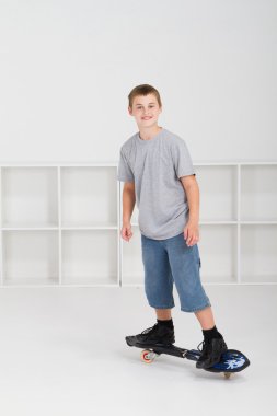 Teen boy skateboarding clipart