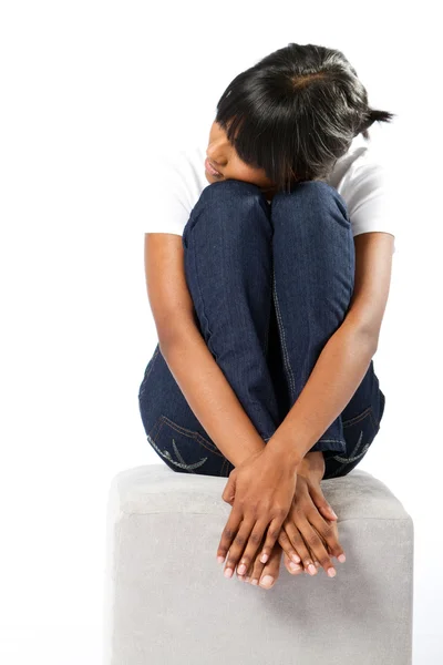 Young indian girl sitting on chair — Stock Photo, Image