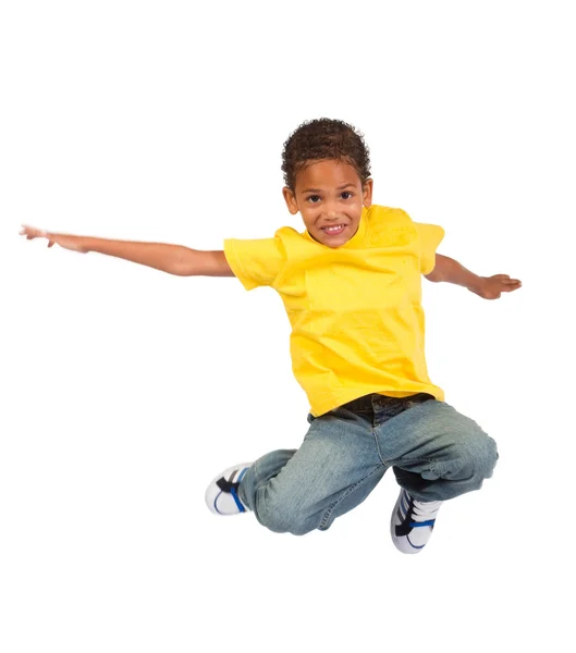 Afro-americano menino pulando — Fotografia de Stock