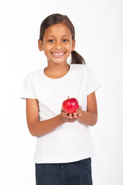 Indian little girl holding a red apple — Stock Photo, Image