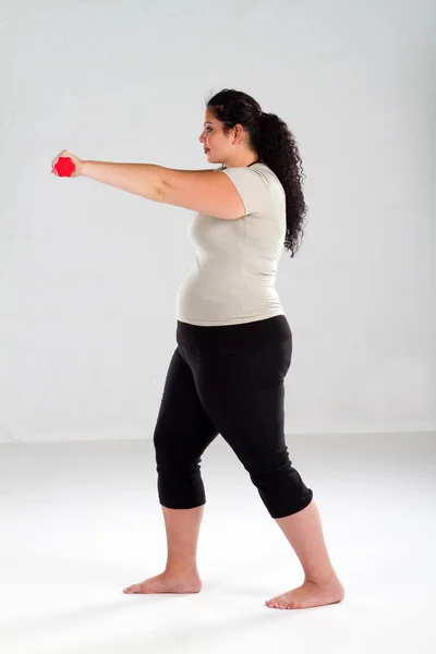 Obézní ženy cvičení — Stock fotografie