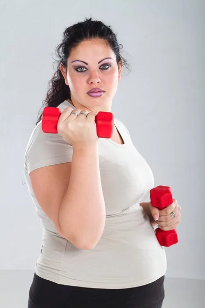 Plus Size mulher se preparando para o exercício — Fotografia de Stock