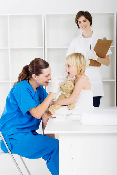 Paediatrician checking little patient — Stock Photo, Image