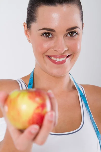 Fitness woman with an apple — Stock Photo, Image
