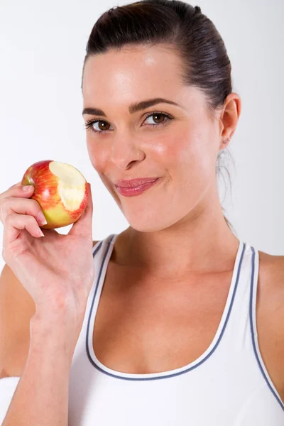 Healthy fitness woman eating apple — Stock Photo, Image