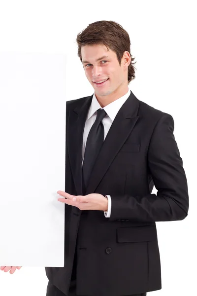 Mladý podnikatel drží bílou tabuli — Stock fotografie
