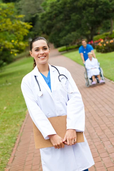 Beautiful female doctor portrait outdoors — Stock Photo, Image