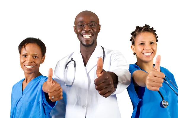 Medico africano e infermiera dando pollici in su — Foto Stock