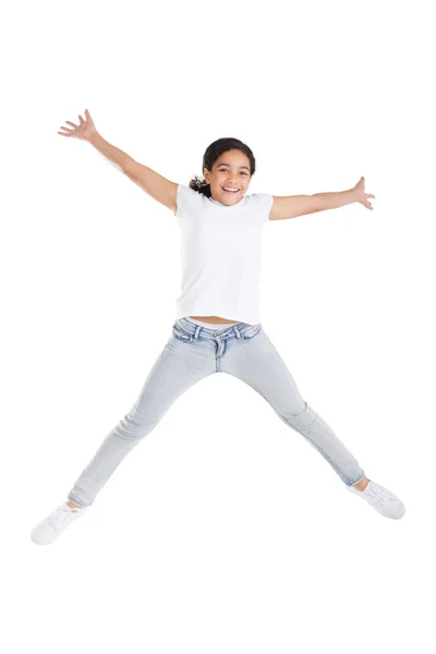 Mutlu kız yüksek atlama — Stok fotoğraf