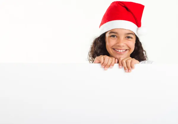 可爱的小女孩身穿圣诞老人帽子 — 图库照片