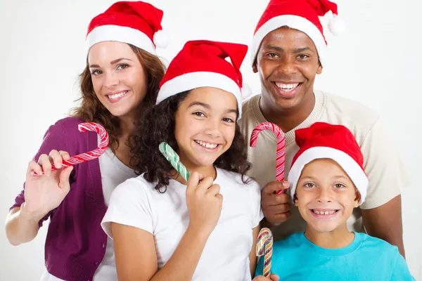 Familie met Kerstmis riet van het suikergoed — Stockfoto