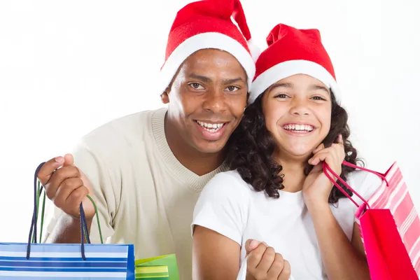 Feliz padre e hija con bolsas de compras de Navidad —  Fotos de Stock