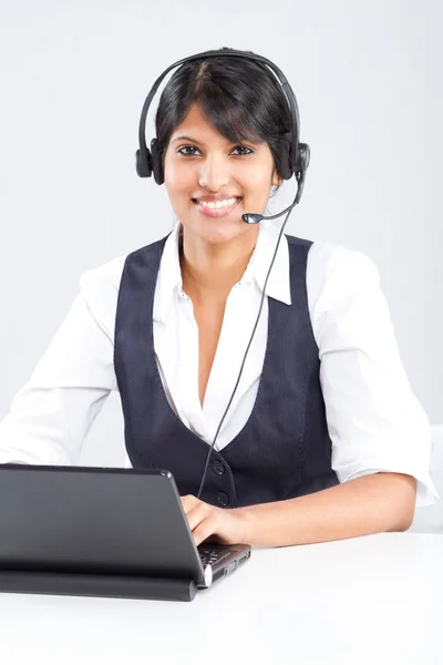 Happy indian call center operator with headset — Stock Photo, Image