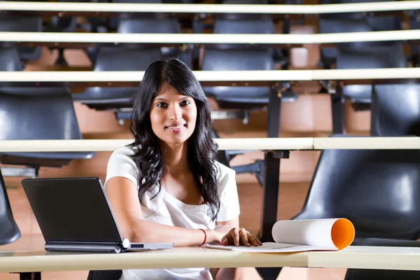 Female college student in university lecture room — Stock Photo, Image