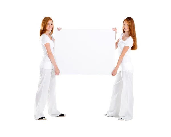 Young teen girl holding white board — Stock Photo, Image