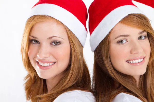 Щасливі молоді різдвяні дівчата — стокове фото
