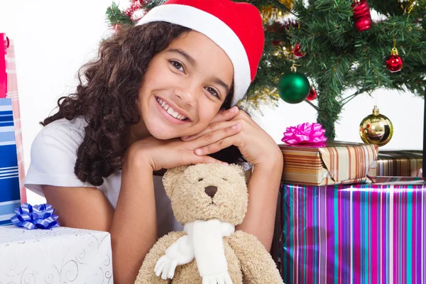 Happy cute little girl with presents Stock Image