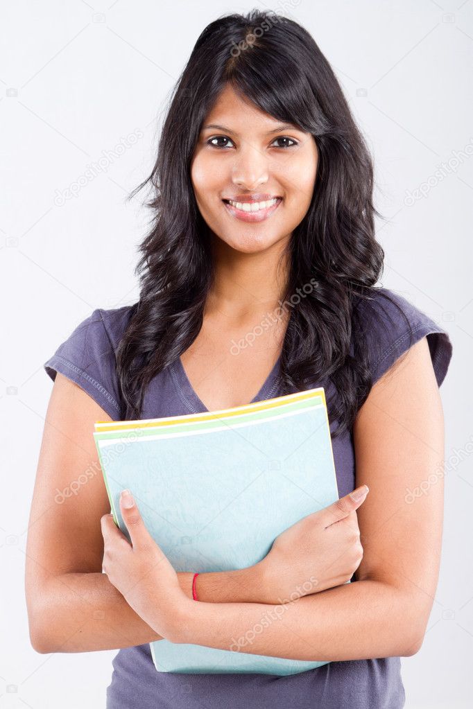 Cute indian university student holding books
