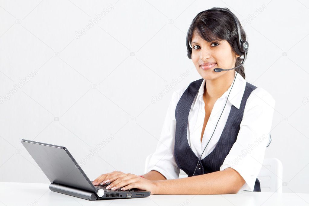 Happy indian call center operator with headset