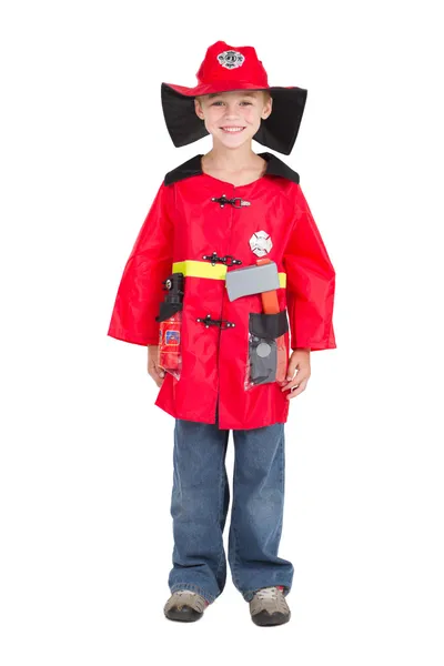 Niño pequeño con uniforme de bombero — Foto de Stock