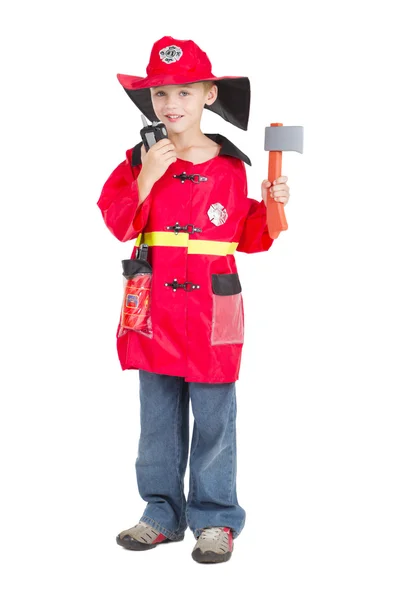 Menino como bombeiro com walkie talkie e machado — Fotografia de Stock