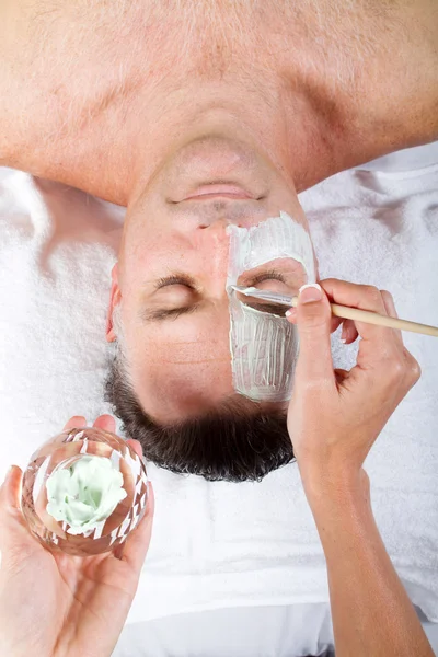 Middle age man with facial mask — Stock Photo, Image