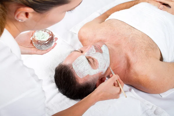 Man facial mask in luxury beauty spa — Stock Photo, Image