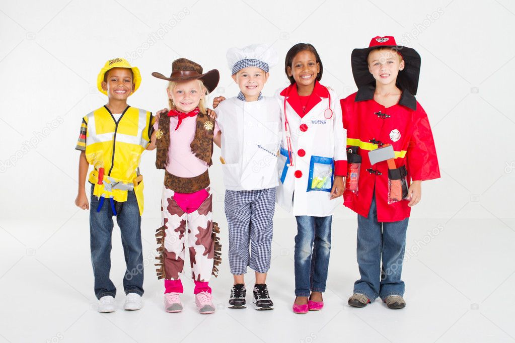 Group of children dressing in various uniforms